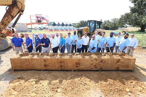 MaCarthy---Grounbreaking Group photo of construction and utility officials with shovels at Harpool Plant groundbreaking ceremony.